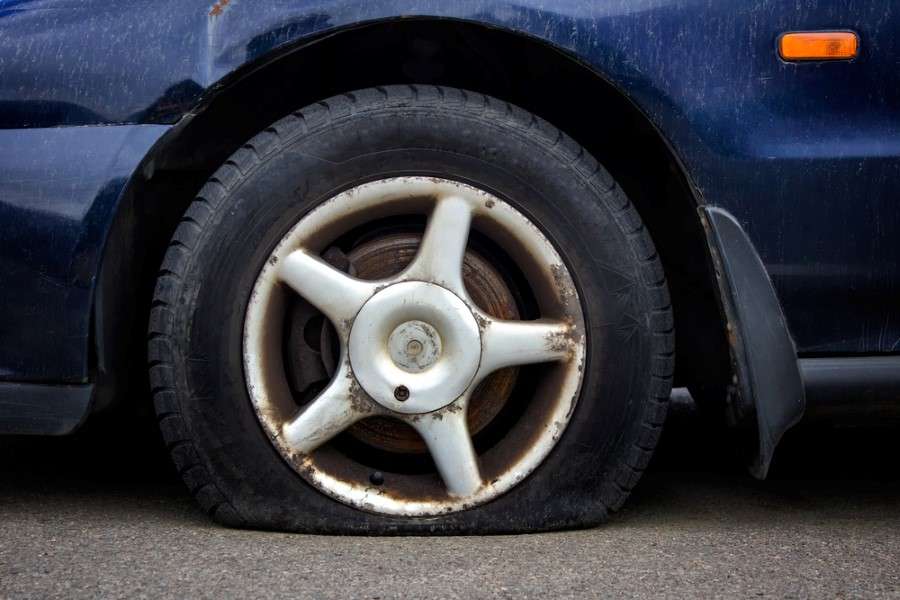 Flat stuck tire