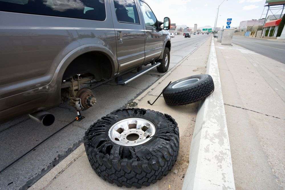 Vehicle Changing Flat Tire